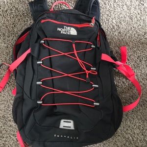 Dark gray and neon borealis North Face backpack